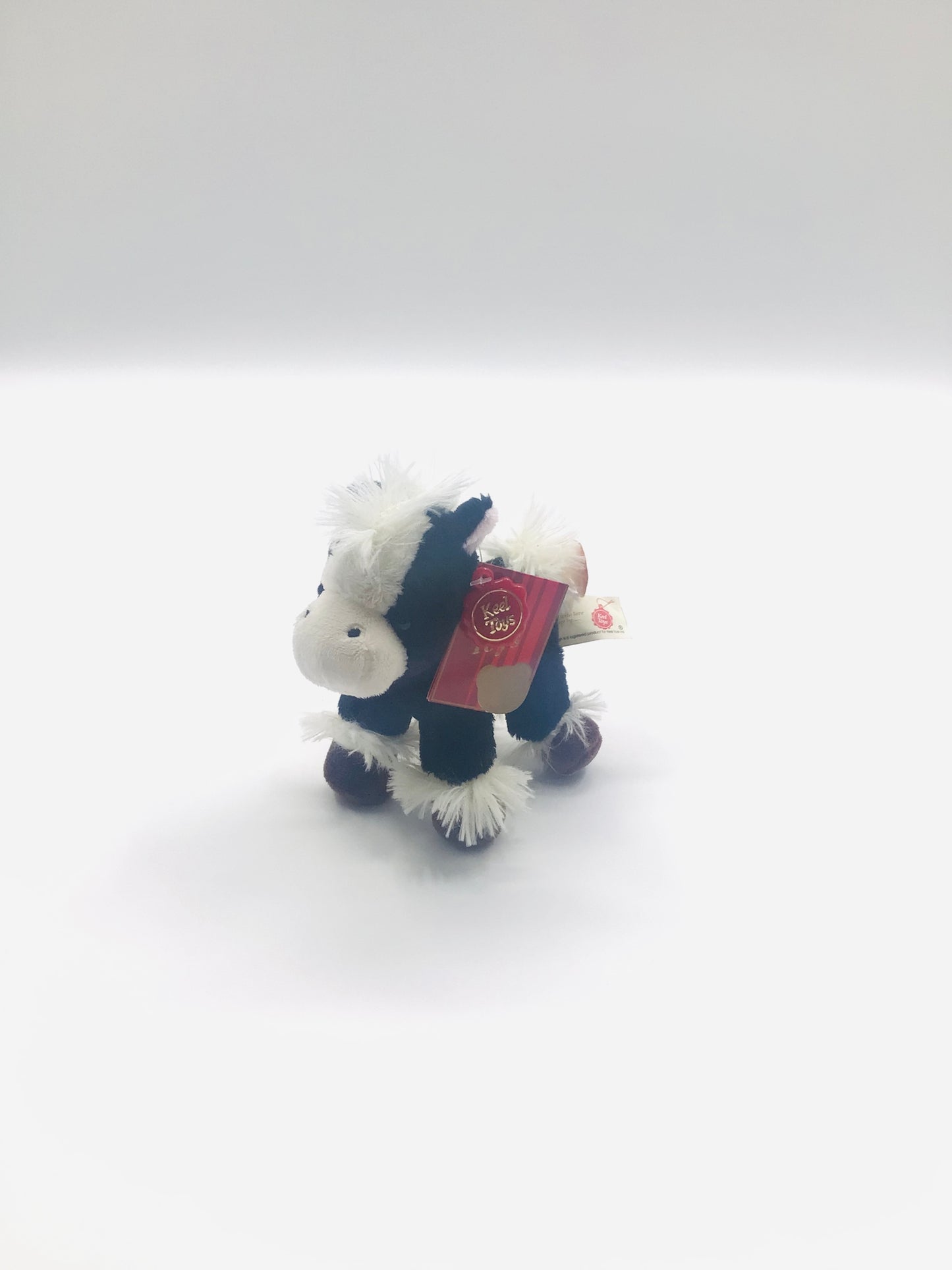 Tiny black musical horse bear